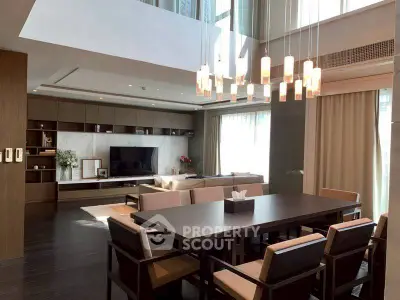 Luxurious modern living room with elegant dining area and stylish lighting