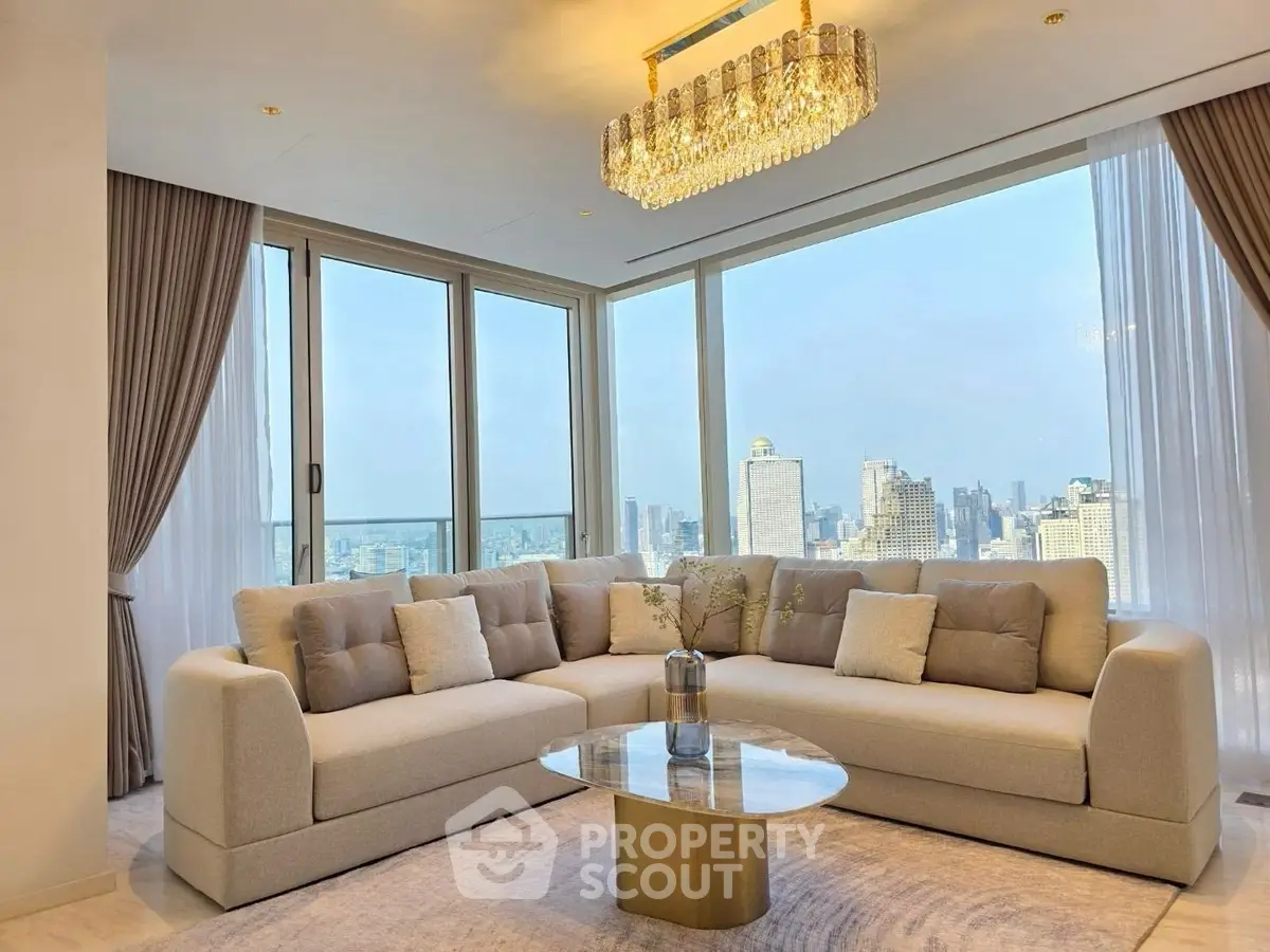 Luxurious living room with panoramic city view and elegant chandelier