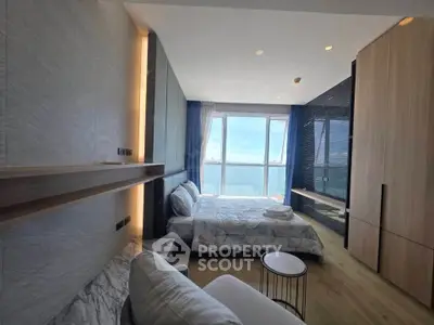 Luxurious bedroom with stunning ocean view and modern decor