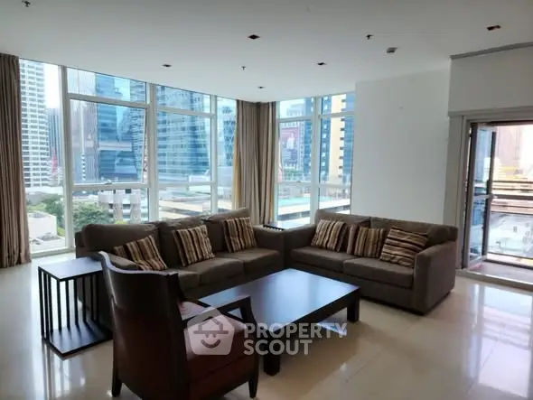 Spacious modern living room with city view and elegant furniture
