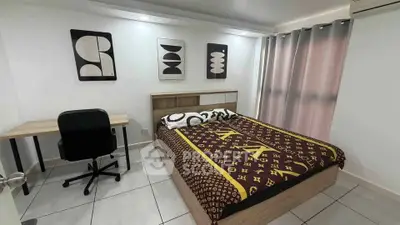 Modern bedroom with stylish decor and workspace, perfect for urban living.