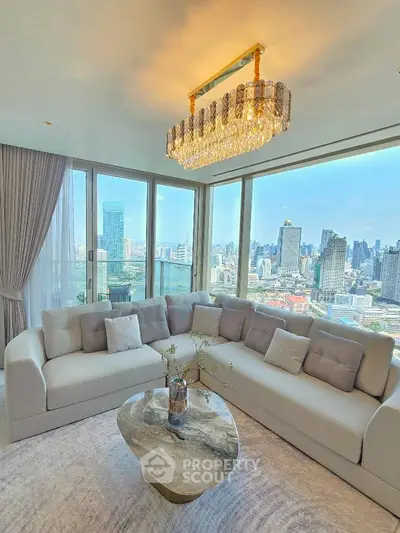 Luxurious living room with panoramic city view and elegant chandelier
