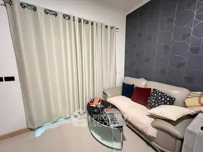 Cozy living room with modern decor and comfortable seating