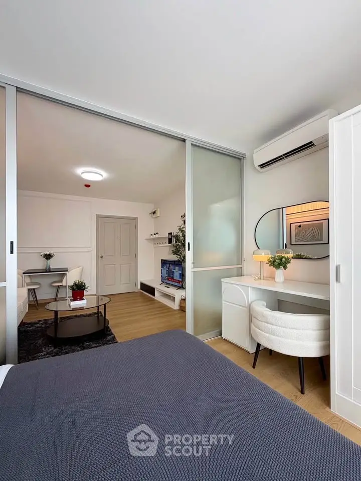 Modern bedroom with sliding doors and stylish decor