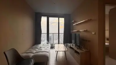 Modern living room with panoramic city view and stylish furniture