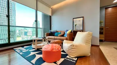 Modern living room with city view, stylish furniture, and large windows.