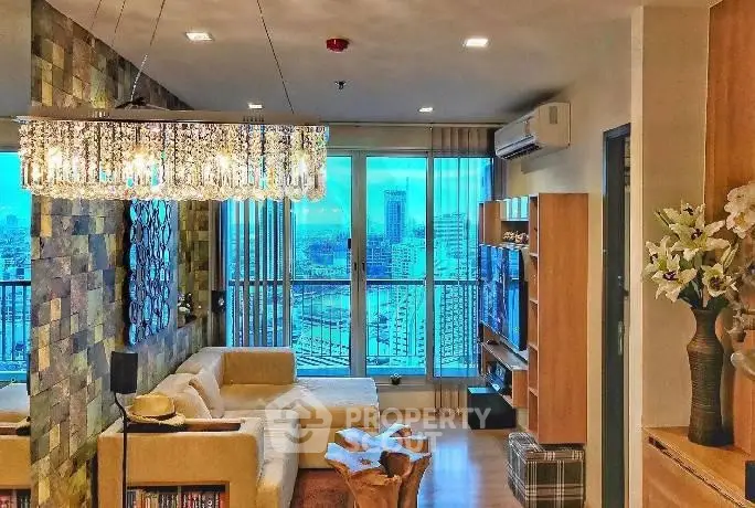 Luxurious living room with stunning city view and elegant chandelier