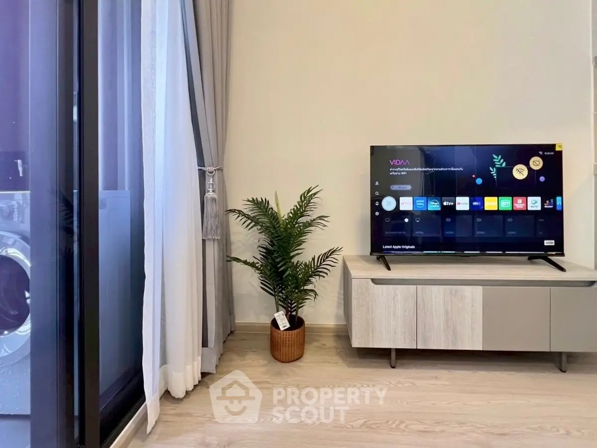 Modern living room with sleek TV setup and stylish decor