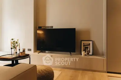 Modern living room with sleek TV setup and stylish decor