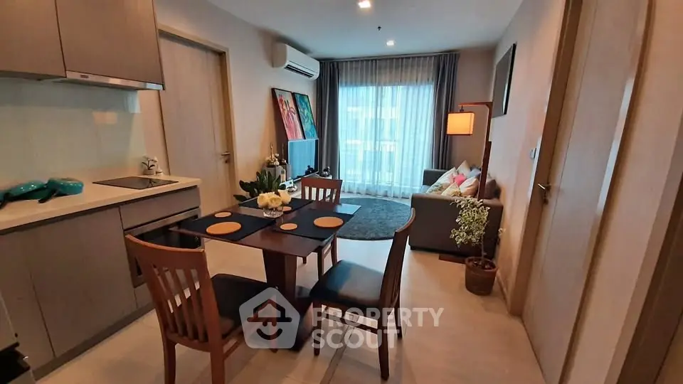 Modern open-layout living room with dining area and stylish decor