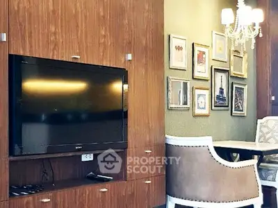 Stylish living room with wall-mounted TV and elegant dining area