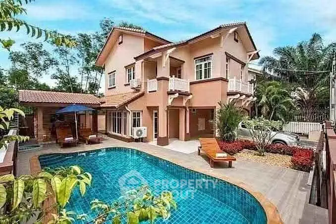 Luxurious villa with private pool and lush garden in serene setting.