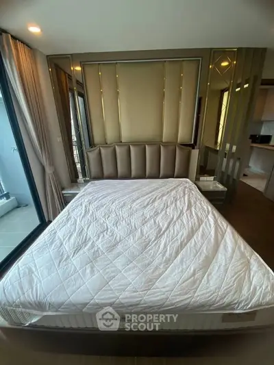 Luxurious bedroom with modern design and large windows for natural light