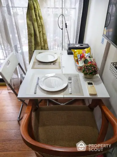 Cozy dining nook with elegant table setting and natural light