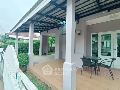 Charming patio area with outdoor seating in a suburban home