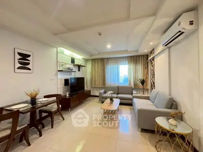 Spacious modern living room with elegant decor and natural light
