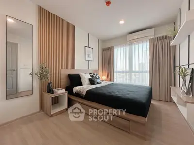 Modern bedroom with wooden accents and large window offering city view