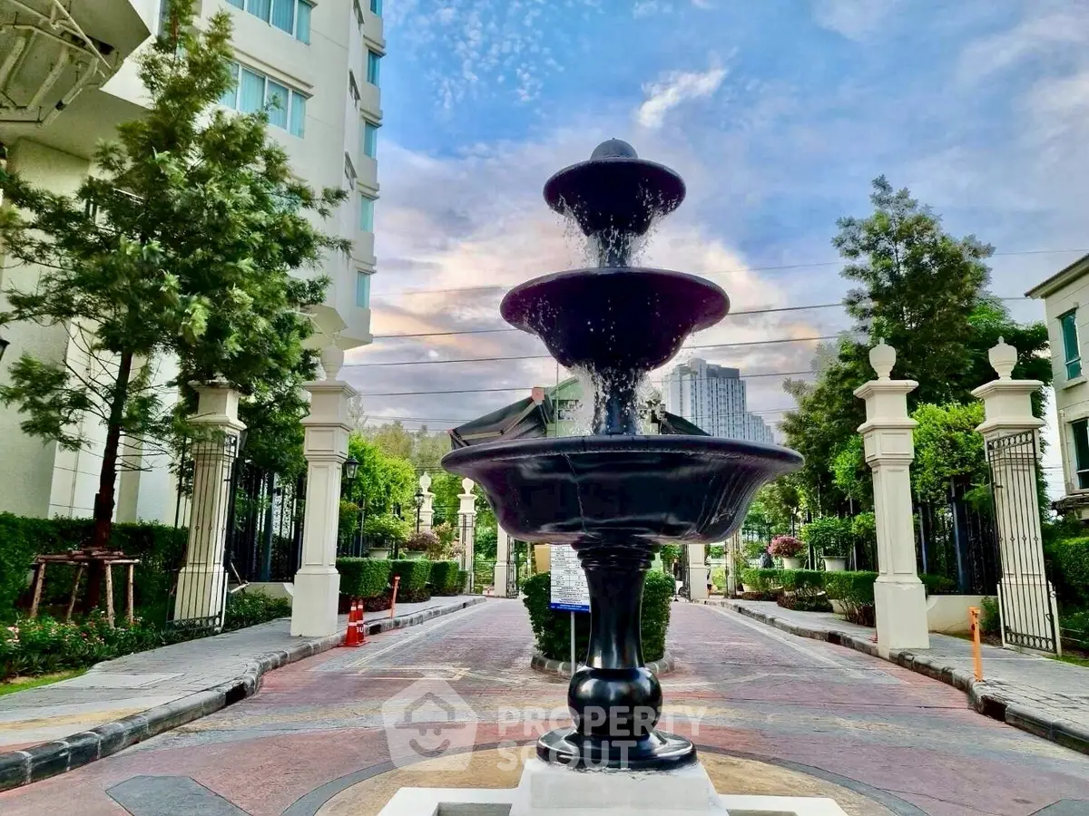 Elegant garden fountain in luxurious residential complex entrance