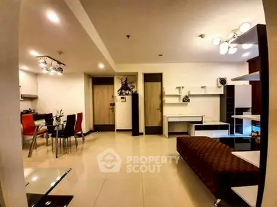 Spacious modern living room with dining area and stylish lighting