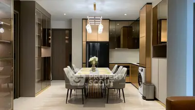 Luxurious modern kitchen with elegant dining area and built-in appliances