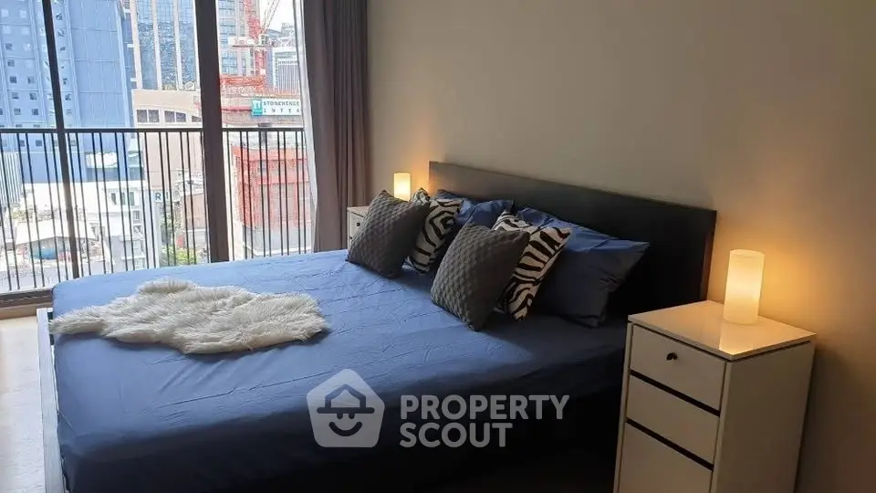 Modern bedroom with city view and stylish decor