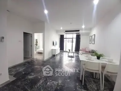 Spacious modern living room with dining area and stylish decor