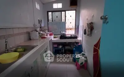 Cozy kitchen with gas stove and ample storage space