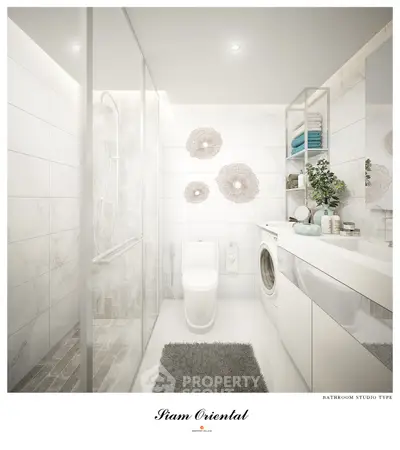 Modern bathroom with sleek design, featuring a washing machine and elegant decor in a stylish studio apartment.