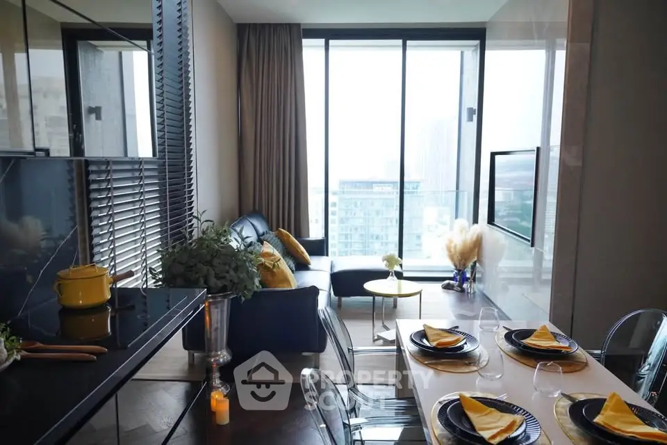 Modern living room with elegant dining area and city view, featuring stylish decor and floor-to-ceiling windows.