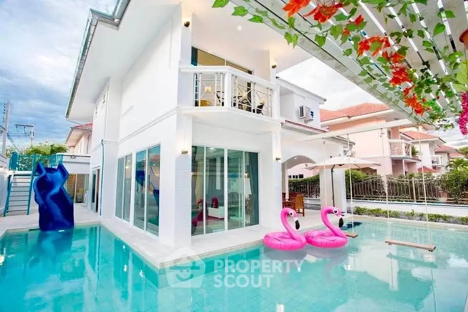 Luxurious modern villa with pool and balcony, perfect for family living.