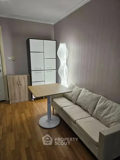 Cozy living room with modern furniture and stylish lighting