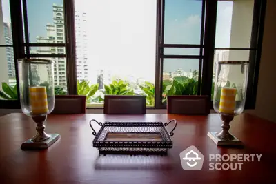 Elegant dining area with city view and stylish decor