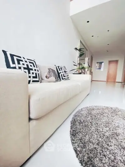 Stylish modern living room with elegant sofa and chic decor