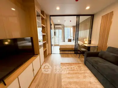 Modern studio apartment with open layout and stylish furnishings