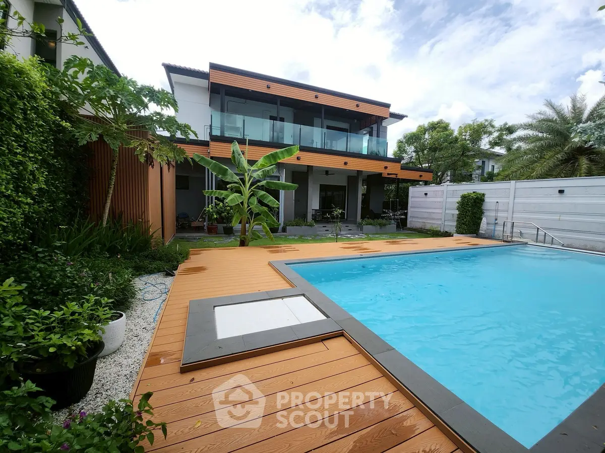 Luxurious modern home with private pool and lush garden