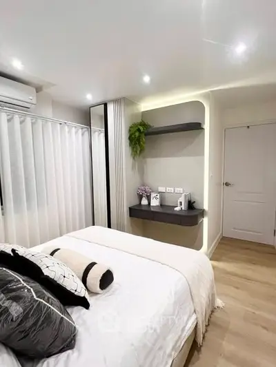 Modern bedroom with stylish decor and cozy ambiance