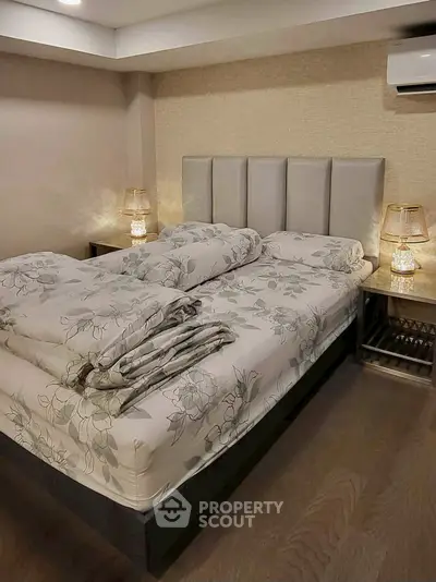 Cozy bedroom with elegant lighting and modern decor