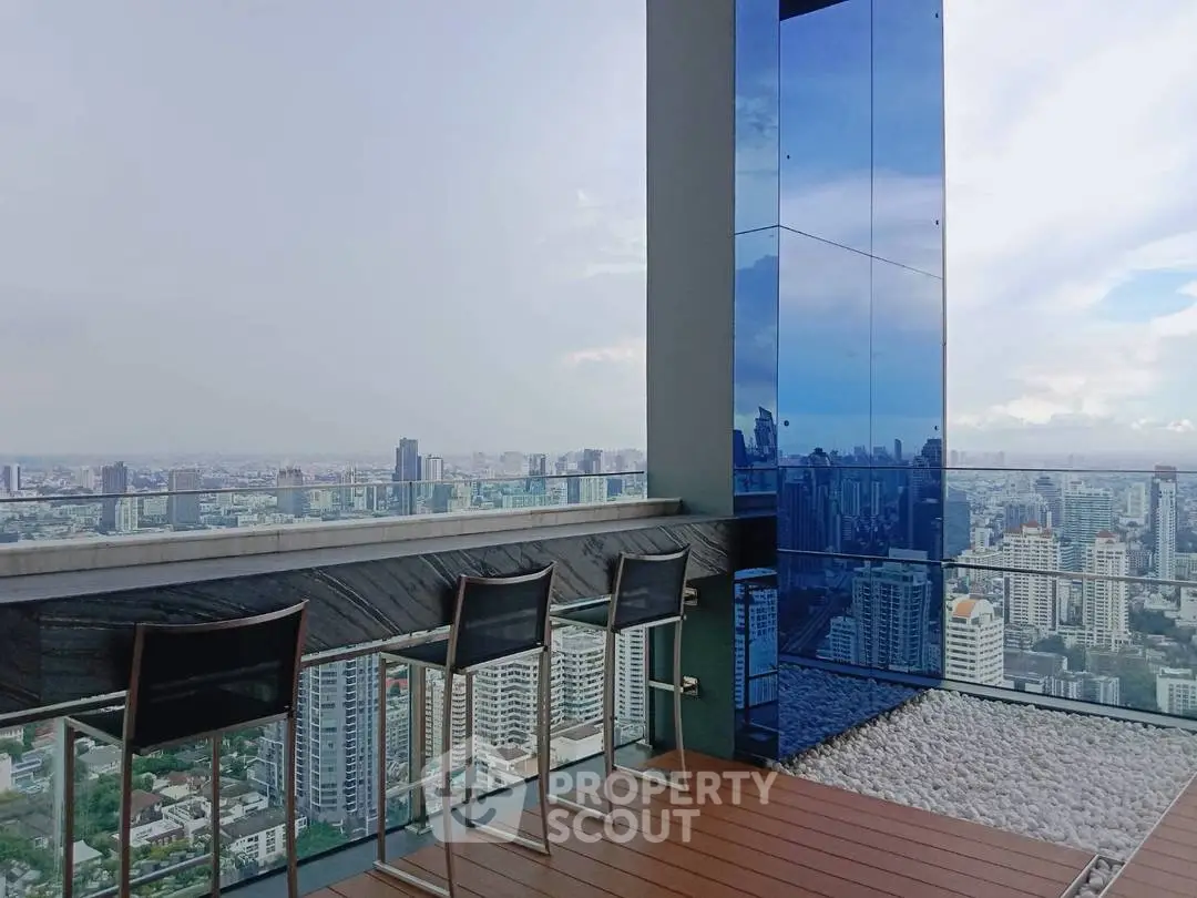 Stunning rooftop view with modern seating overlooking city skyline, perfect for urban living.