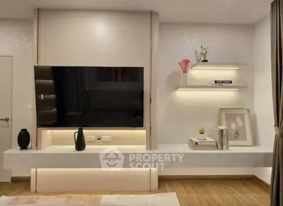 Modern living room with sleek TV unit and stylish decor