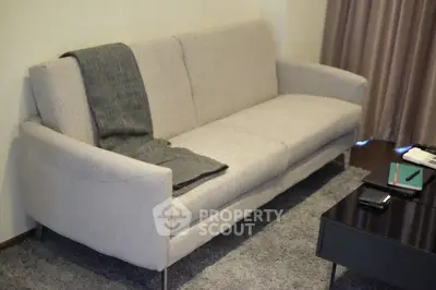 Modern living room with stylish sofa and cozy decor