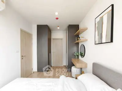 Modern bedroom with minimalist decor and stylish wall art