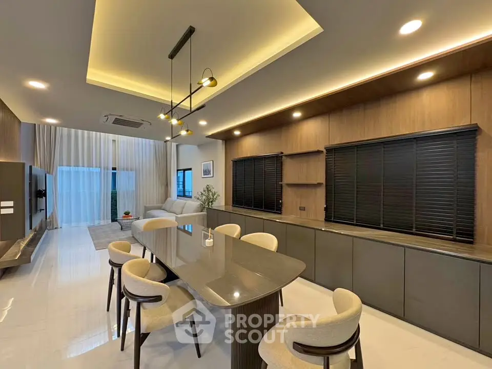 Luxurious modern dining room with elegant lighting and stylish furniture