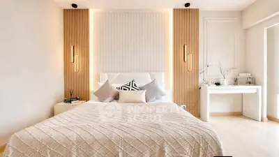 Luxurious modern bedroom with elegant lighting and stylish decor