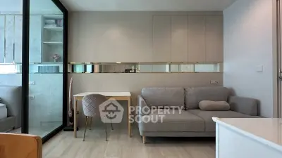 Modern living room with elegant decor and cozy seating area