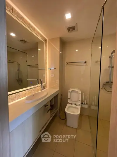 Modern bathroom with sleek design and spacious shower area