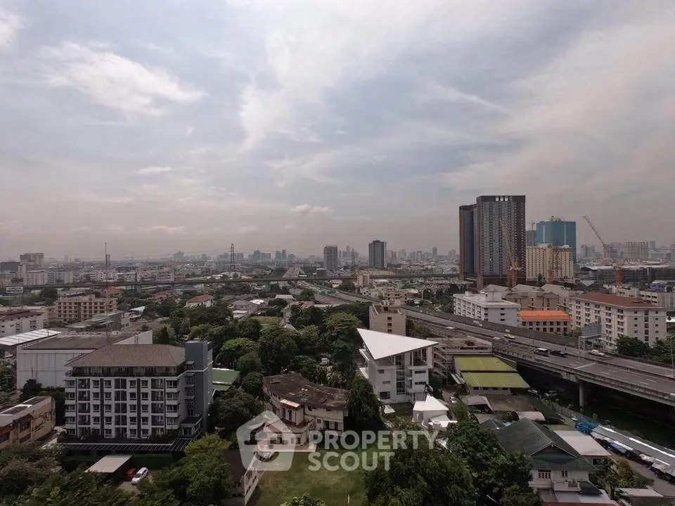 Stunning cityscape view showcasing urban skyline and residential buildings, perfect for real estate investment.