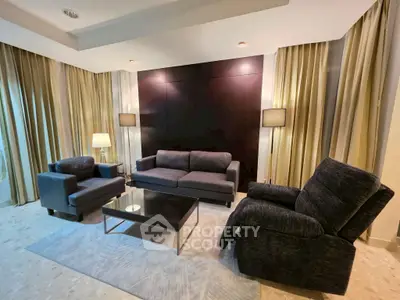 Luxurious living room with modern furniture and elegant lighting