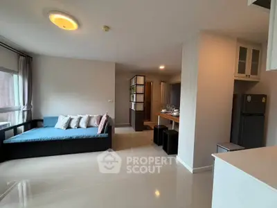 Spacious modern living room with sleek furniture and open layout, perfect for urban living.
