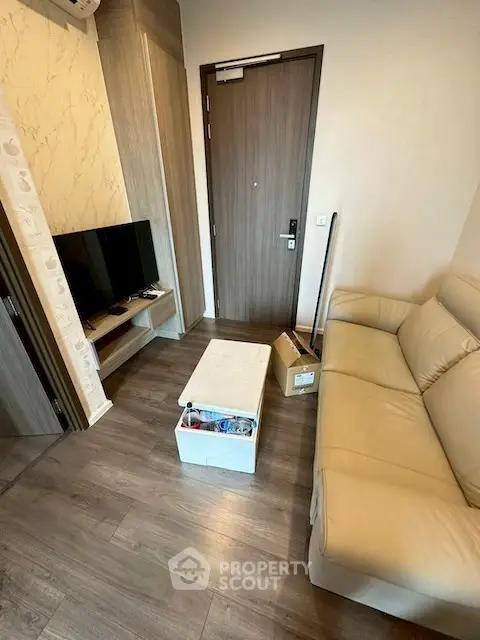 Cozy living room with modern decor and wooden flooring