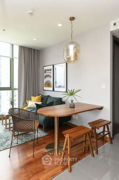 Modern living room with stylish furniture and elegant decor in a bright apartment.